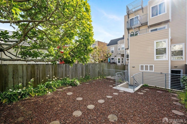 view of yard featuring fence
