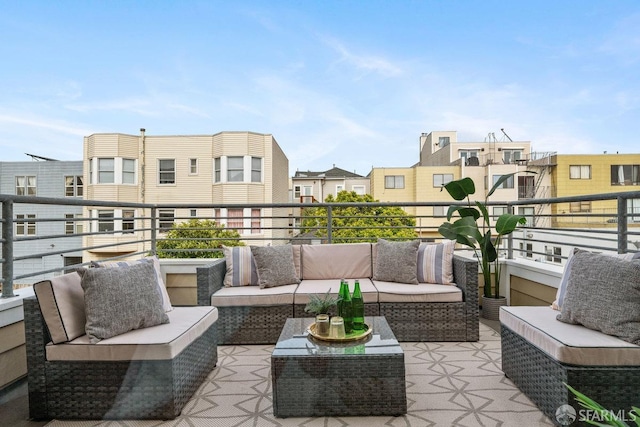 balcony featuring a residential view and an outdoor hangout area