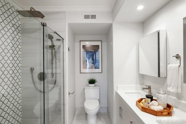 full bathroom with toilet, tiled shower, vanity, ornamental molding, and recessed lighting