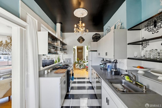 157-167 Vicksburg St, San Francisco, CA 94114 - kitchen with open shelves, a sink, stainless steel appliances, and white cabinets