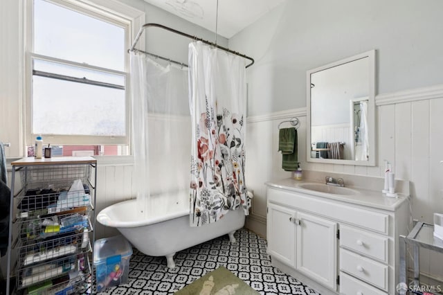 157-167 Vicksburg St, San Francisco, CA 94114 - full bathroom featuring a freestanding bath, a wainscoted wall, vanity, and a shower with shower curtain