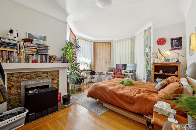 157-167 Vicksburg St, San Francisco, CA 94114 - bedroom with wood finished floors and a fireplace