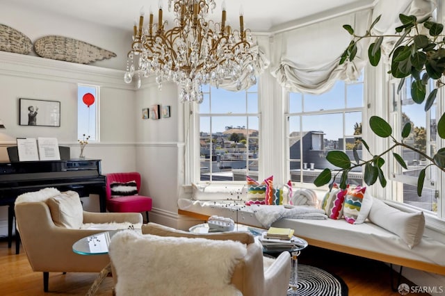 157-167 Vicksburg St, San Francisco, CA 94114 - living area with a chandelier and wood finished floors