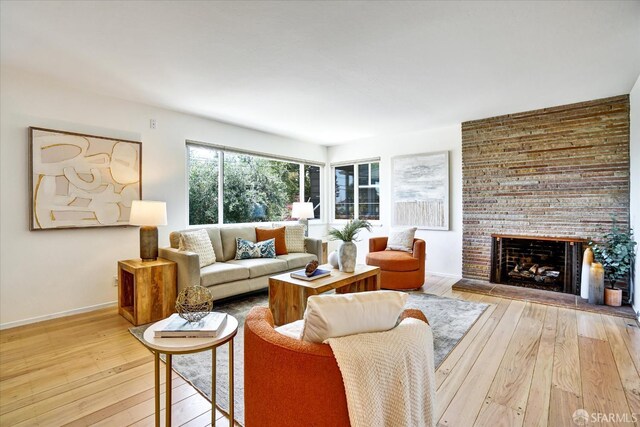 1751 Leimert Blvd, Oakland, CA 94602 - living area featuring wood-type flooring and a brick fireplace