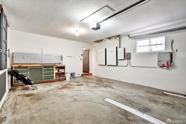 1751 Leimert Blvd, Oakland, CA 94602 - garage featuring a workshop area and a garage door opener