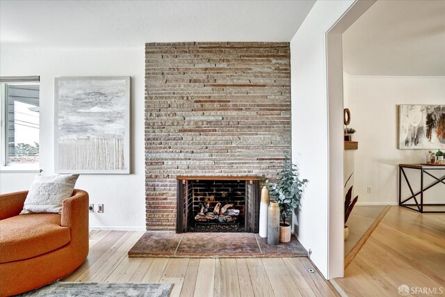 1751 Leimert Blvd, Oakland, CA 94602 - living area featuring wood finished floors and a fireplace