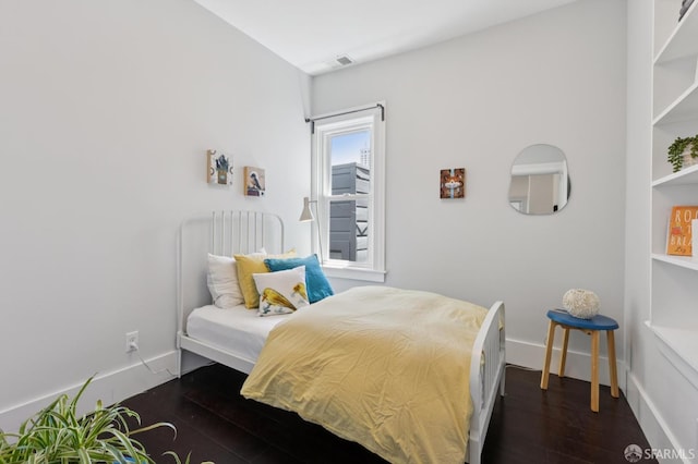 1034 Jackson St, San Francisco, CA 94133 - bedroom with dark wood-type flooring and baseboards