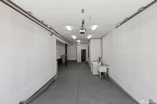 1034 Jackson St, San Francisco, CA 94133 - garage featuring baseboards and a garage door opener