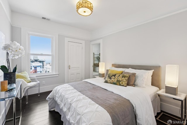 1034 Jackson St, San Francisco, CA 94133 - bedroom featuring dark wood-style flooring and baseboards