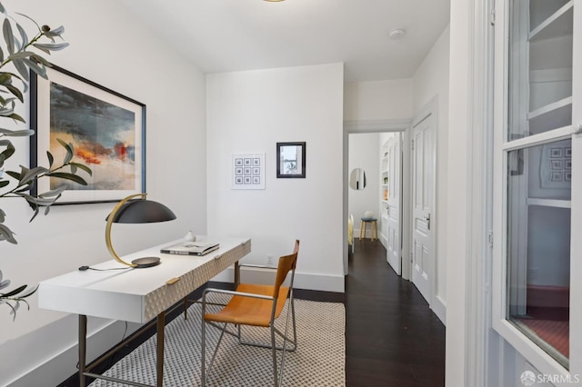 1034 Jackson St, San Francisco, CA 94133 - home office featuring dark wood-type flooring and baseboards