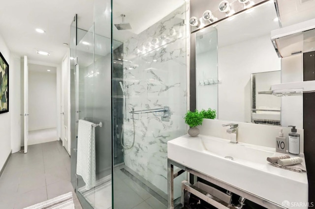 1875 Mission St Unit 304, San Francisco, CA 94103 - bathroom with a marble finish shower, vanity, tile patterned flooring, and recessed lighting