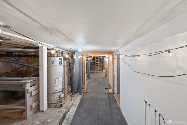 unfinished basement with gas water heater