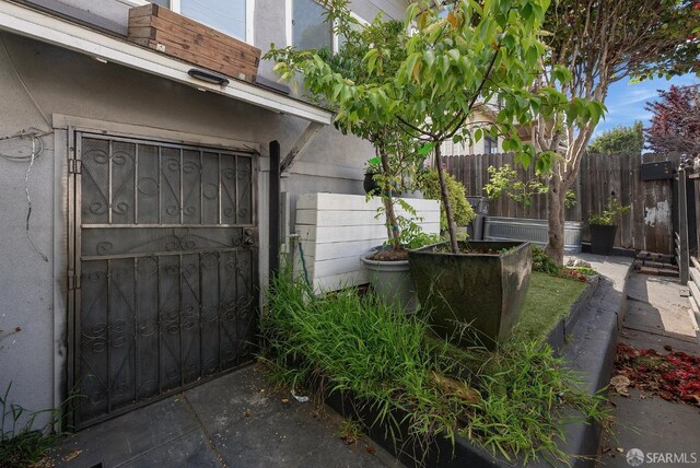 garage with fence