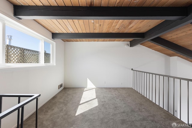 bonus room with lofted ceiling with beams, carpet, and wood ceiling