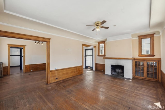 2440-2442 Balboa St, San Francisco, CA 94121 - unfurnished living room with a ceiling fan, dark wood-style flooring, a fireplace, and a wainscoted wall