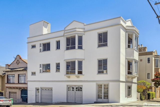 2440-2442 Balboa St, San Francisco, CA 94121 - view of building exterior featuring a garage and driveway