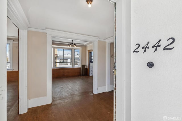 2440-2442 Balboa St, San Francisco, CA 94121 - corridor with wood finished floors, crown molding, a chandelier, and baseboards