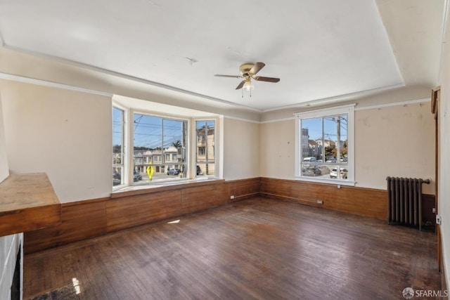 2440-2442 Balboa St, San Francisco, CA 94121 - unfurnished room featuring radiator, wood finished floors, a ceiling fan, and a wainscoted wall