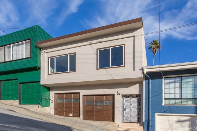 view of property exterior featuring a garage