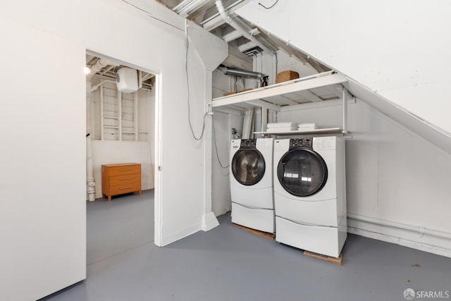 laundry area with independent washer and dryer