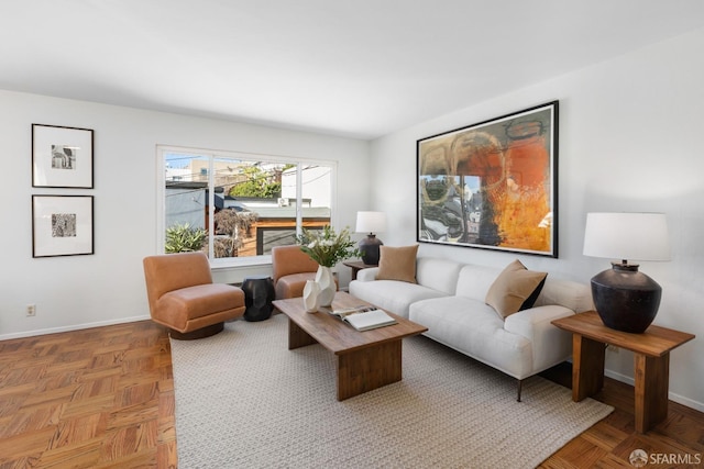 living room featuring parquet floors