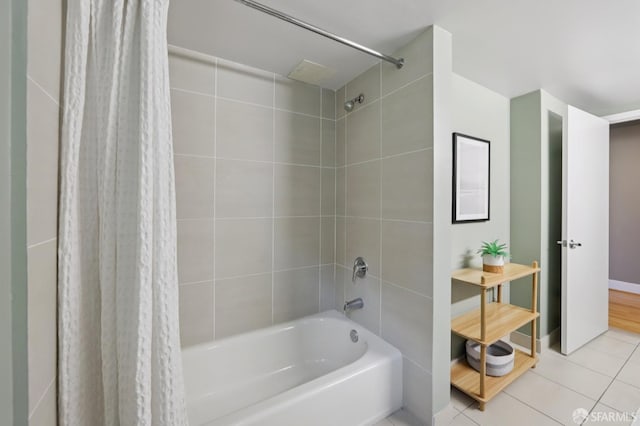 311 Oak St Unit 301, Oakland, CA 94607 - full bathroom with shower / bathtub combination with curtain, tile patterned floors, and baseboards