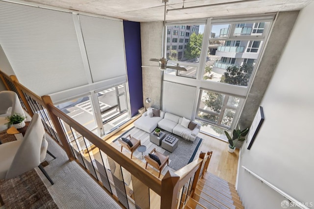 311 Oak St Unit 301, Oakland, CA 94607 - living room with wood finished floors and a wall of windows