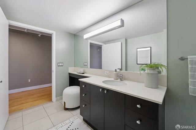 311 Oak St Unit 301, Oakland, CA 94607 - bathroom featuring vanity, tile patterned flooring, and baseboards