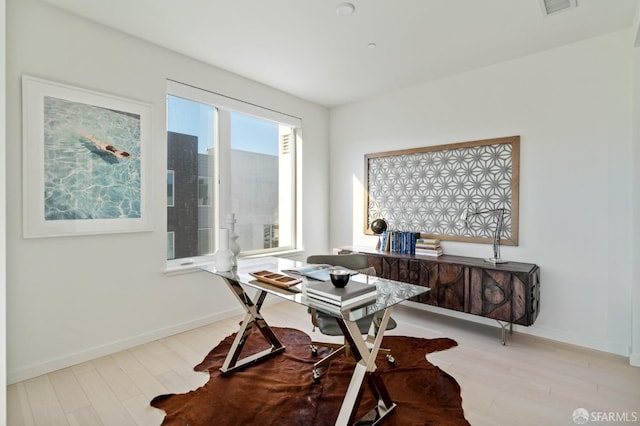 office space featuring light hardwood / wood-style floors