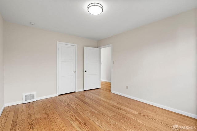 empty room featuring light hardwood / wood-style floors