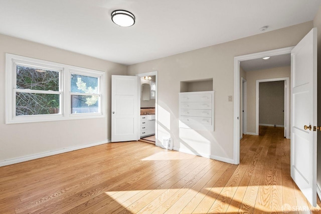 unfurnished bedroom featuring light hardwood / wood-style flooring