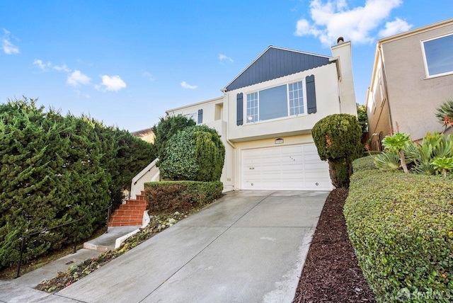 view of front of home with a garage