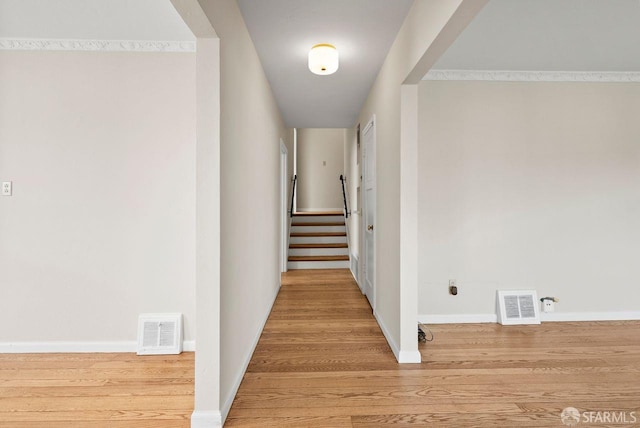 corridor featuring light hardwood / wood-style flooring