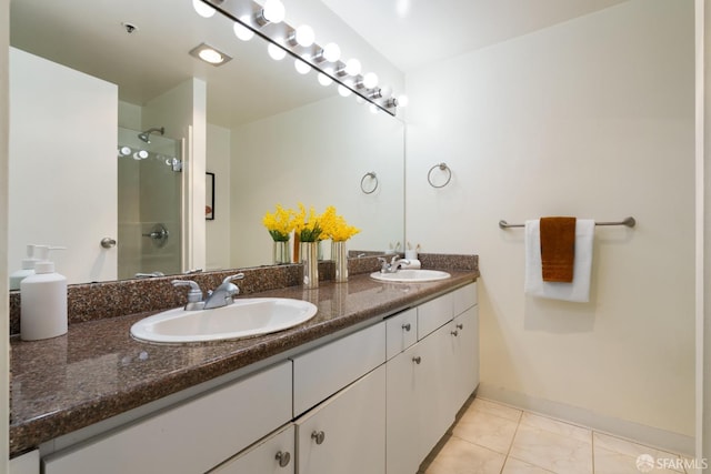 601 Van Ness Ave Unit 39, San Francisco, CA 94102 - full bath featuring a sink, baseboards, a shower with door, and double vanity