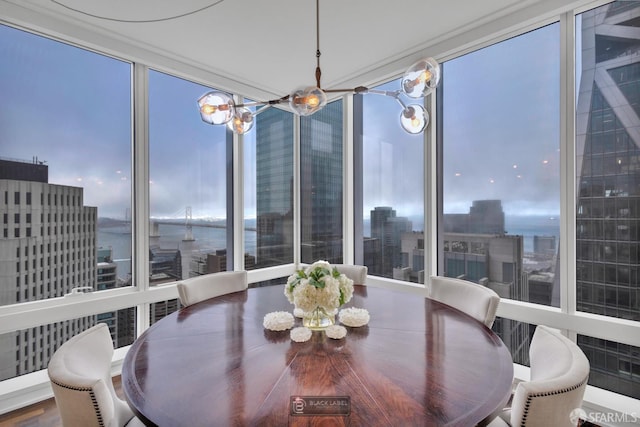 301 Mission St Unit 40D, San Francisco, CA 94105 - dining room featuring a chandelier and a city view