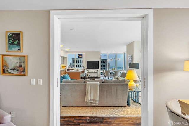 301 Mission St Unit 40D, San Francisco, CA 94105 - living room featuring a chandelier and wood finished floors
