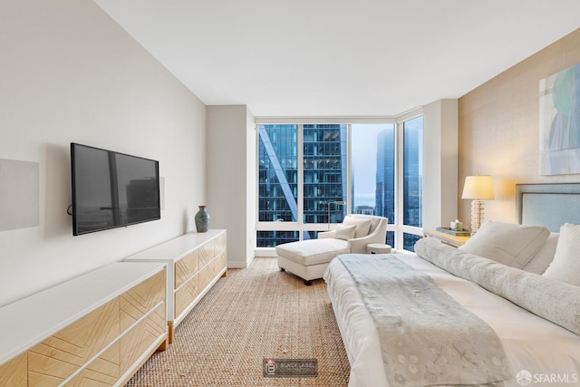 301 Mission St Unit 40D, San Francisco, CA 94105 - bedroom with expansive windows and baseboards