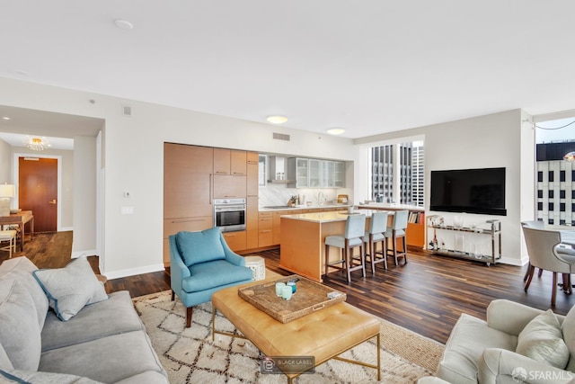 301 Mission St Unit 40D, San Francisco, CA 94105 - living room with dark wood-style floors and baseboards