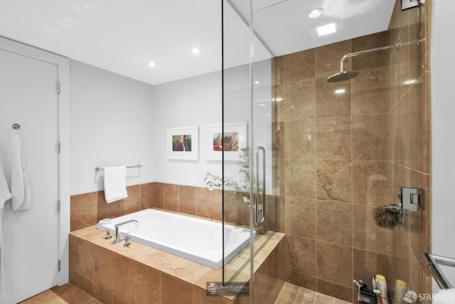301 Mission St Unit 40D, San Francisco, CA 94105 - bathroom with tiled shower, a garden tub, and recessed lighting