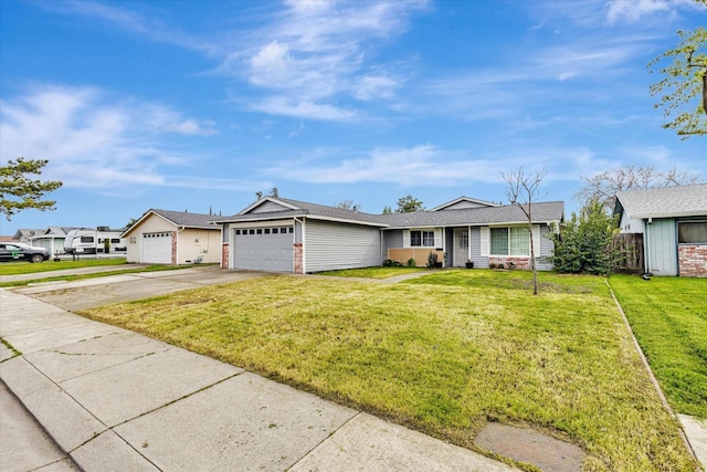 ranch-style house with an attached garage, concrete driveway, brick siding, and a front yard