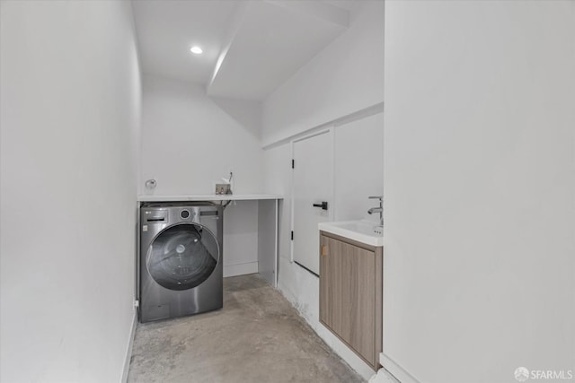 laundry room featuring washer / clothes dryer and sink