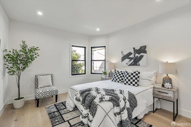 bedroom featuring light hardwood / wood-style floors