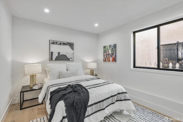 bedroom featuring light hardwood / wood-style floors