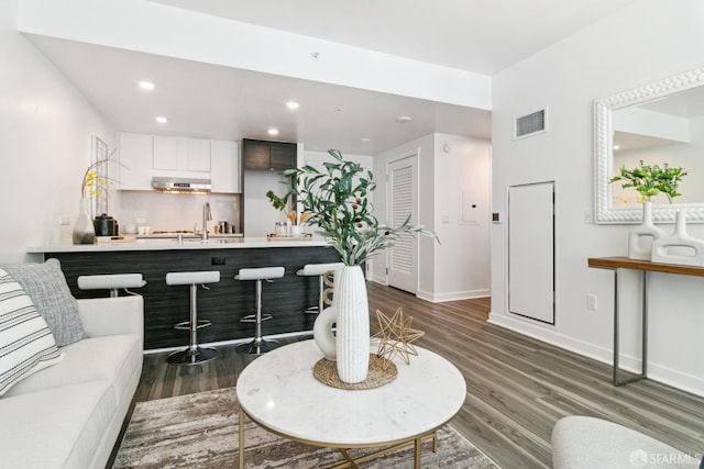 1688 Pine St Unit E709, San Francisco, CA 94109 - living area with dark wood-style floors, baseboards, and recessed lighting