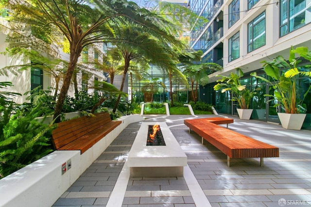 1688 Pine St Unit E709, San Francisco, CA 94109 - view of home's community with an outdoor fire pit and a patio