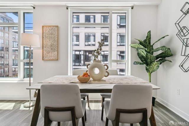 1688 Pine St Unit E709, San Francisco, CA 94109 - dining room featuring wood finished floors and baseboards