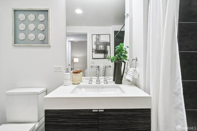 1688 Pine St Unit E709, San Francisco, CA 94109 - bathroom with toilet, vanity, and recessed lighting
