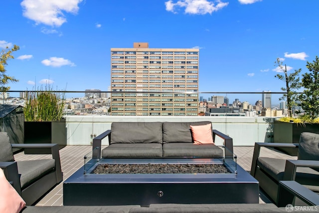 1688 Pine St Unit E709, San Francisco, CA 94109 - wooden terrace with an outdoor living space with a fire pit and a view of city