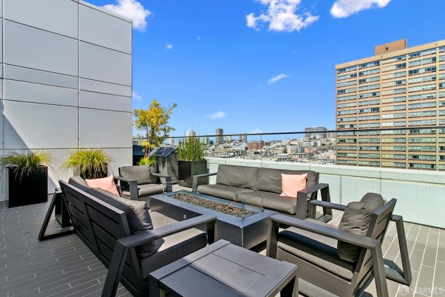 1688 Pine St Unit E709, San Francisco, CA 94109 - view of patio featuring an outdoor living space with a fire pit and a view of city