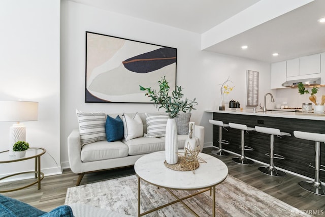 1688 Pine St Unit E709, San Francisco, CA 94109 - living area with wood finished floors, baseboards, and recessed lighting